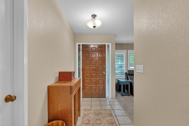 5072 N Forkner Ave, Fresno, CA 93711 - entryway with a textured wall and light tile patterned floors