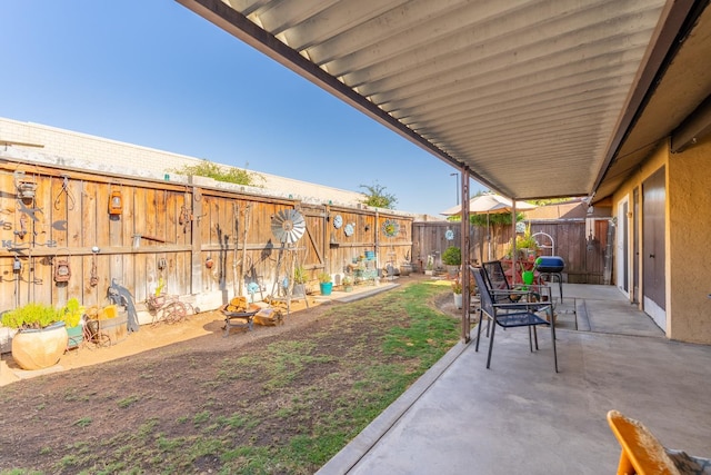 5072 N Forkner Ave, Fresno, CA 93711 - fenced backyard featuring a patio