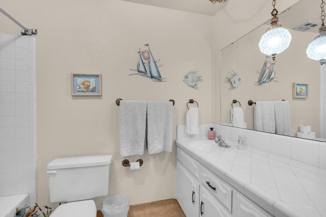 5072 N Forkner Ave, Fresno, CA 93711 - full bathroom featuring vanity, toilet, and tile patterned floors