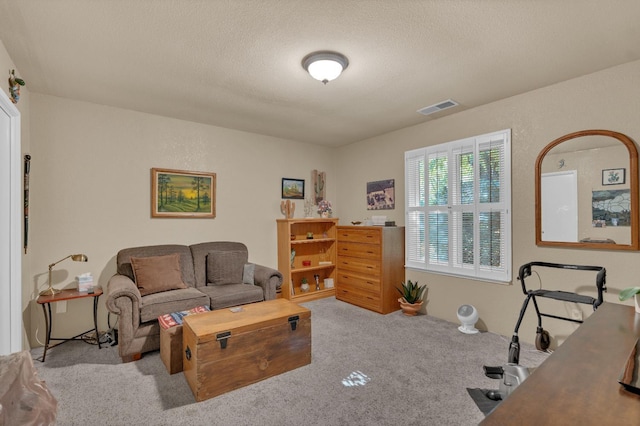 5072 N Forkner Ave, Fresno, CA 93711 - living area featuring carpet floors and a textured ceiling