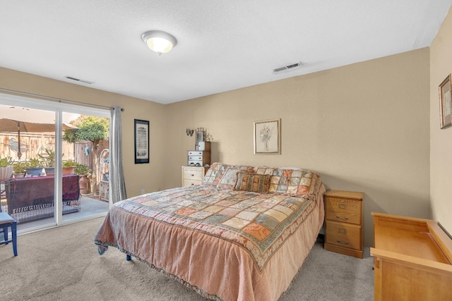 5072 N Forkner Ave, Fresno, CA 93711 - bedroom with light colored carpet and access to outside