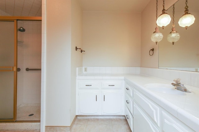 5072 N Forkner Ave, Fresno, CA 93711 - bathroom featuring vanity, tile patterned flooring, and a shower stall