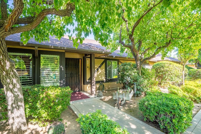 5072 N Forkner Ave, Fresno, CA 93711 - view of front of home with roof with shingles