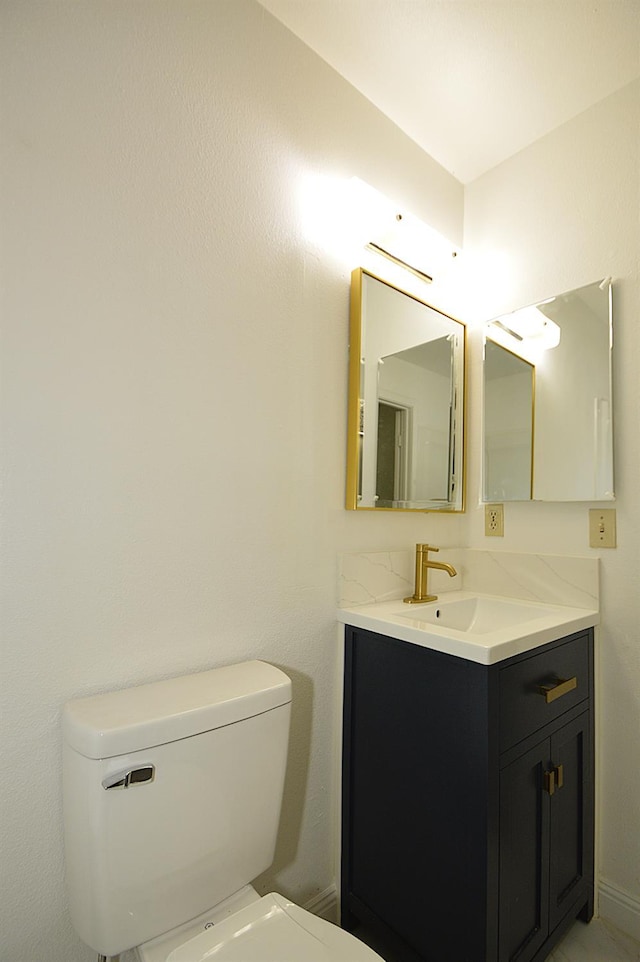 4779 N Cedar Ave # 109, Fresno, CA 93726 - half bathroom featuring vanity and toilet