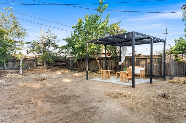 1586 N Calaveras St, Fresno, CA 93728 - fenced backyard featuring a patio