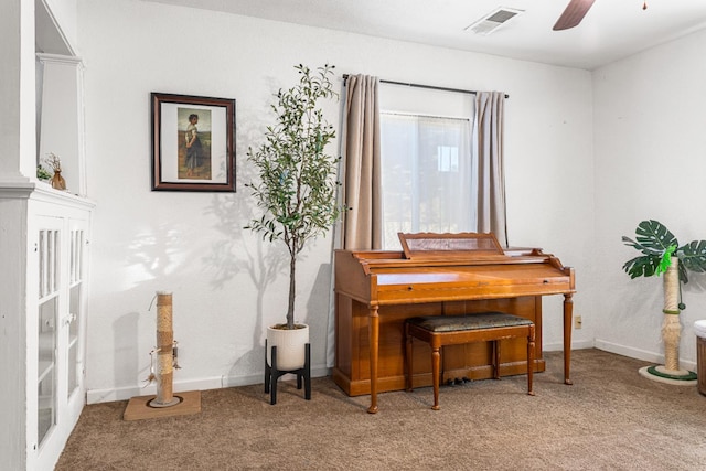 1586 N Calaveras St, Fresno, CA 93728 - living area featuring carpet floors, a ceiling fan, and baseboards
