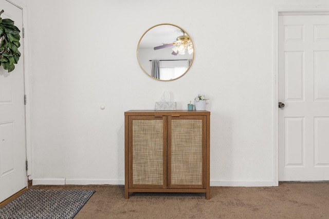 1586 N Calaveras St, Fresno, CA 93728 - carpeted entryway with baseboards and a ceiling fan