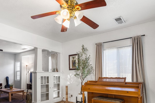 1586 N Calaveras St, Fresno, CA 93728 - sitting room with ceiling fan, baseboards, an office area, and a textured ceiling