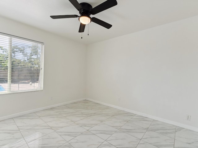 2091 E Cromwell Ave, Fresno, CA 93720 - spare room with baseboards and a ceiling fan