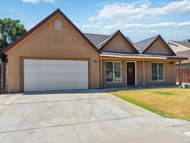2091 E Cromwell Ave, Fresno, CA 93720 - view of front of house with stucco siding, concrete driveway, an attached garage, a porch, and roof with shingles