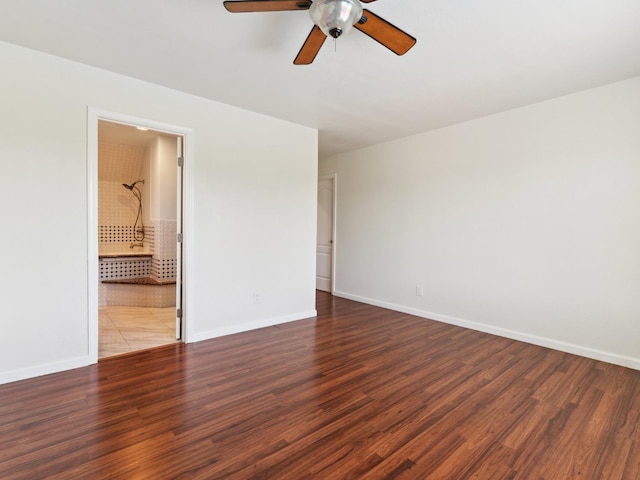 2091 E Cromwell Ave, Fresno, CA 93720 - empty room with a ceiling fan and wood finished floors