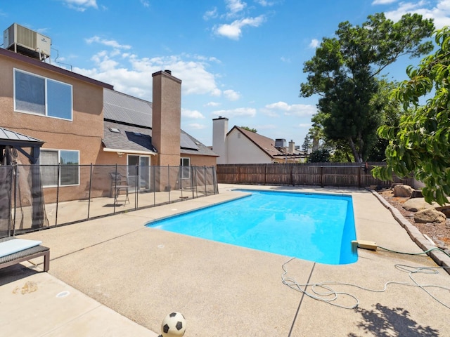 2091 E Cromwell Ave, Fresno, CA 93720 - view of swimming pool featuring a patio area and a fenced backyard