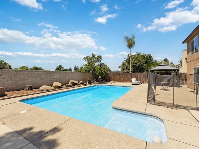 2091 E Cromwell Ave, Fresno, CA 93720 - view of swimming pool featuring a gazebo, a patio area, and a fenced backyard