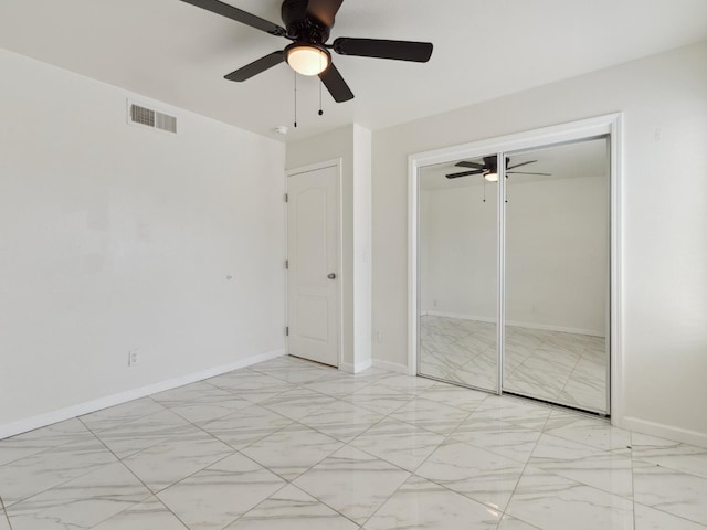 2091 E Cromwell Ave, Fresno, CA 93720 - unfurnished bedroom featuring a ceiling fan and a closet