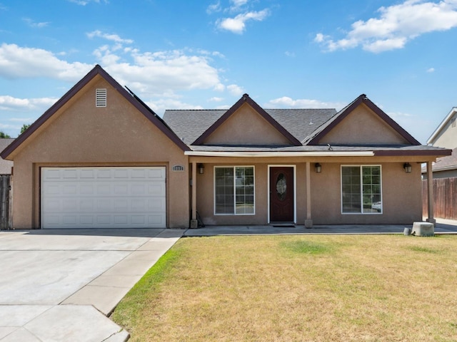 2091 E Cromwell Ave, Fresno, CA 93720 - single story home with stucco siding, a garage, concrete driveway, a porch, and roof with shingles