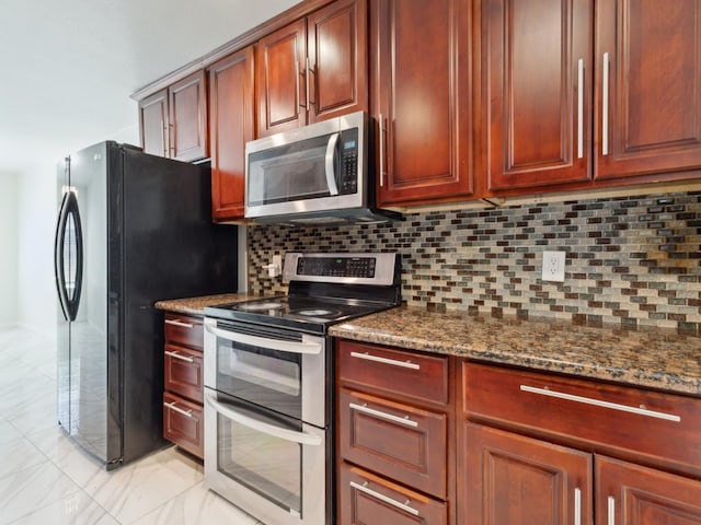 2091 E Cromwell Ave, Fresno, CA 93720 - kitchen featuring stainless steel appliances, decorative backsplash, dark stone countertops, and reddish brown cabinets