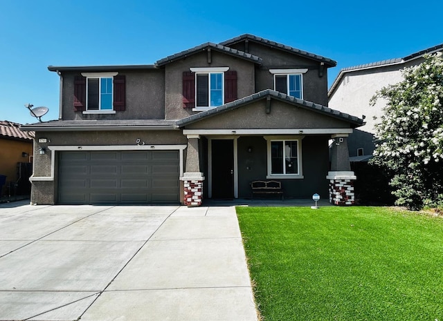 5795 E Beck Ave, Fresno, CA 93727 - view of front of house featuring a porch, concrete driveway, an attached garage, a front yard, and stucco siding