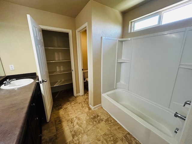 5795 E Beck Ave, Fresno, CA 93727 - full bath featuring vanity, shower / bath combination, and toilet