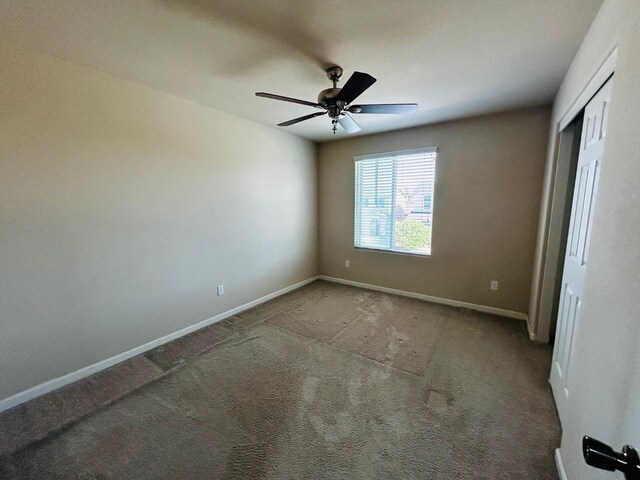 5795 E Beck Ave, Fresno, CA 93727 - unfurnished bedroom with baseboards, carpet floors, a closet, and a ceiling fan