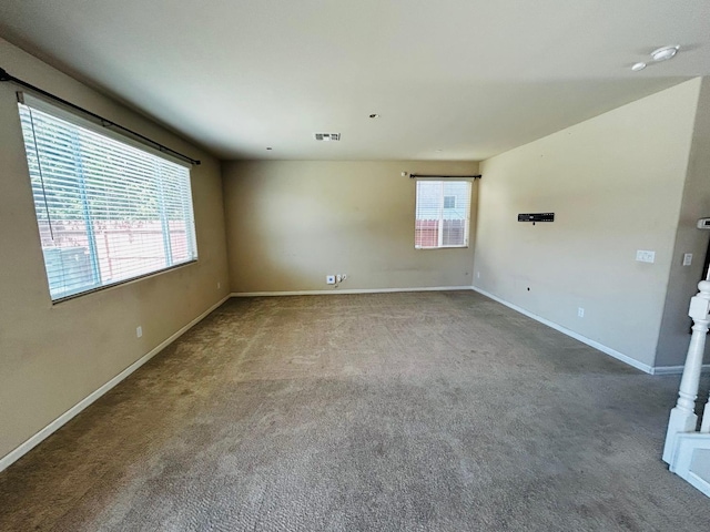 5795 E Beck Ave, Fresno, CA 93727 - spare room featuring carpet flooring, baseboards, and a smoke detector