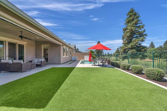 11753 N Turf Dr, Fresno, CA 93730 - view of yard featuring outdoor lounge area, a patio, and ceiling fan