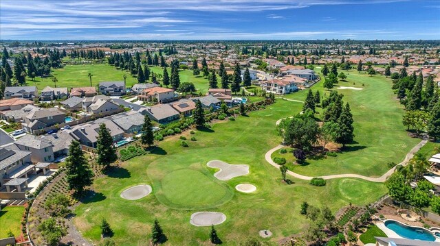 11753 N Turf Dr, Fresno, CA 93730 - aerial view of property and surrounding area with a golf course and nearby suburban area