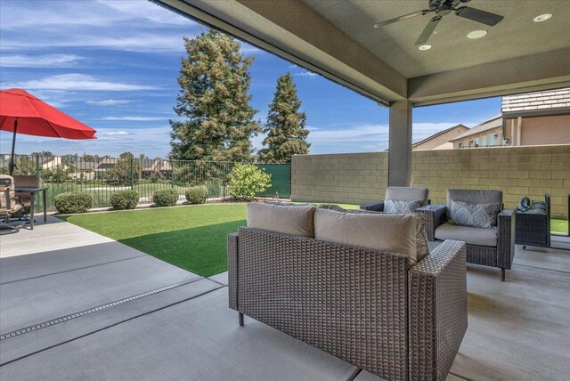 11753 N Turf Dr, Fresno, CA 93730 - view of patio / terrace with ceiling fan and an outdoor living space