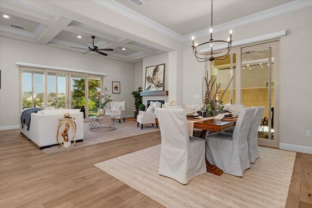 11753 N Turf Dr, Fresno, CA 93730 - dining space featuring light wood-type flooring, a ceiling fan, a chandelier, baseboards, and beamed ceiling