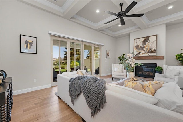 11753 N Turf Dr, Fresno, CA 93730 - living room featuring a glass covered fireplace, light wood finished floors, baseboards, coffered ceiling, and beam ceiling
