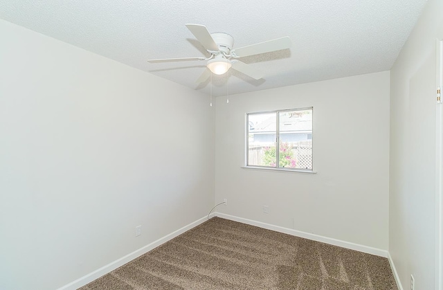 709 Keith St, Lemoore, CA 93245 - unfurnished room featuring dark carpet, a ceiling fan, and a textured ceiling