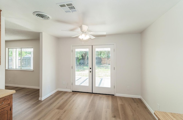709 Keith St, Lemoore, CA 93245 - entryway featuring healthy amount of natural light, light wood finished floors, and ceiling fan