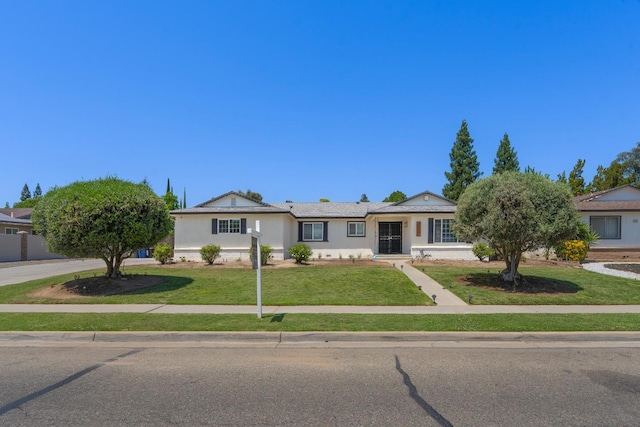 2048 W Sierra Ave, Fresno, CA 93711 - ranch-style house featuring a front yard and stucco siding