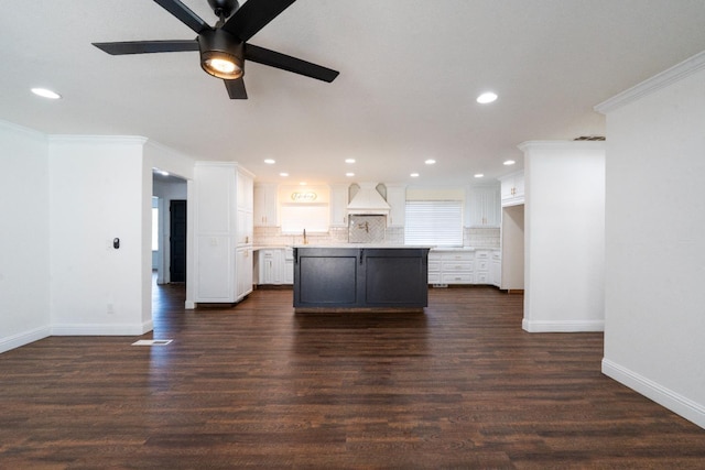 2048 W Sierra Ave, Fresno, CA 93711 - kitchen featuring baseboards, ceiling fan, decorative backsplash, recessed lighting, and white cabinetry