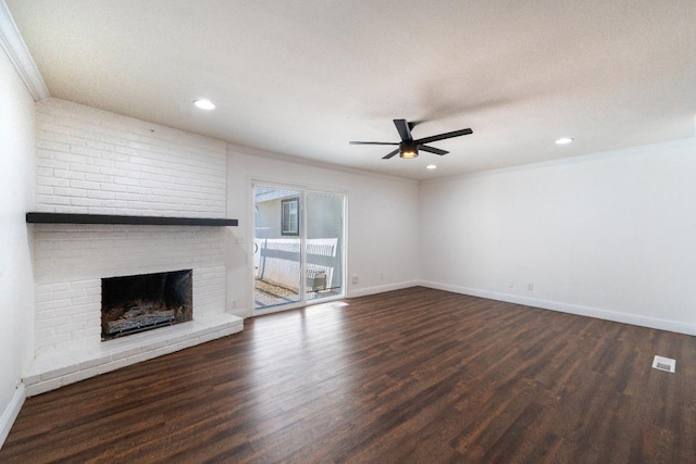 2048 W Sierra Ave, Fresno, CA 93711 - unfurnished living room with a ceiling fan, ornamental molding, a brick fireplace, wood finished floors, and baseboards