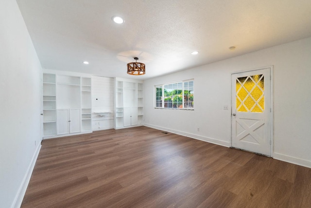 2048 W Sierra Ave, Fresno, CA 93711 - unfurnished living room with baseboards, wood finished floors, and recessed lighting