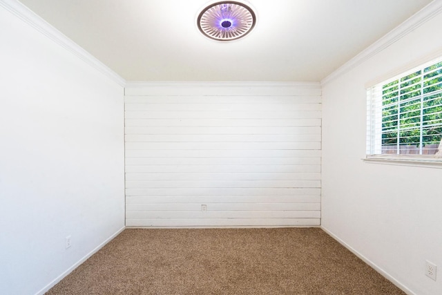 2048 W Sierra Ave, Fresno, CA 93711 - carpeted spare room featuring ornamental molding, baseboards, and wood walls