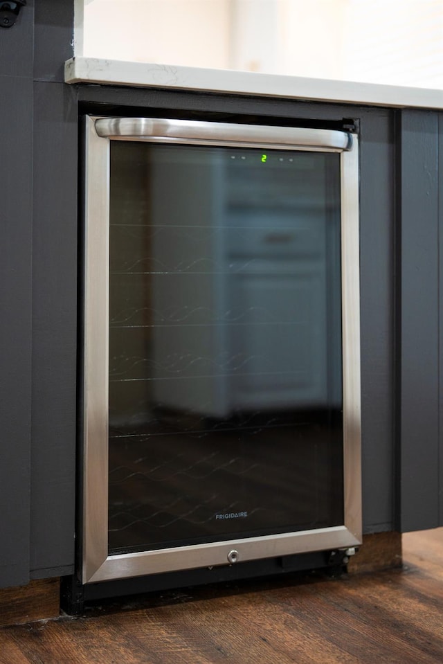 2048 W Sierra Ave, Fresno, CA 93711 - detailed view of wine cooler and dark wood finished floors