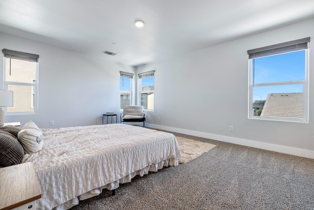 1276 Sauret St, Madera, CA 93638 - carpeted bedroom featuring baseboards and multiple windows