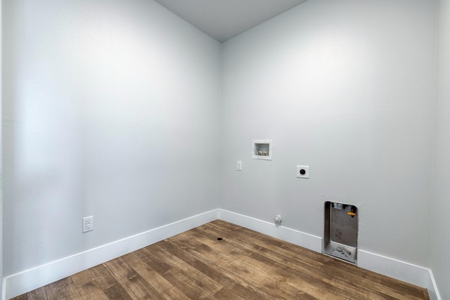 1276 Sauret St, Madera, CA 93638 - laundry room with electric dryer hookup, washer hookup, dark wood finished floors, baseboards, and gas dryer hookup