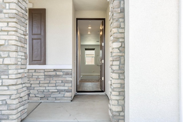 1276 Sauret St, Madera, CA 93638 - property entrance featuring stucco siding and stone siding