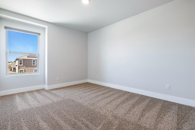 1276 Sauret St, Madera, CA 93638 - spare room featuring carpet floors and baseboards