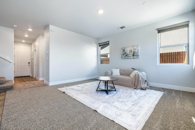 1276 Sauret St, Madera, CA 93638 - living room with carpet floors, recessed lighting, baseboards, and stairway