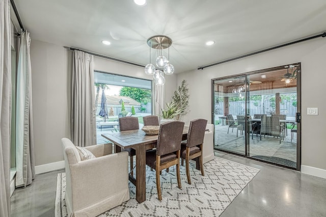 3841 W Alluvial Ave, Fresno, CA 93711 - dining room with baseboards, plenty of natural light, recessed lighting, and a chandelier
