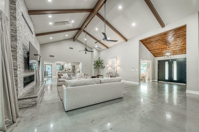 3841 W Alluvial Ave, Fresno, CA 93711 - living area with a stone fireplace, high vaulted ceiling, a ceiling fan, concrete flooring, and beamed ceiling
