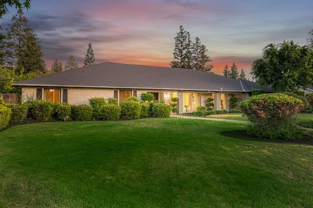 3841 W Alluvial Ave, Fresno, CA 93711 - single story home featuring a yard and brick siding