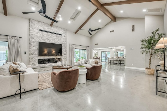 3841 W Alluvial Ave, Fresno, CA 93711 - living room with a ceiling fan, beam ceiling, high vaulted ceiling, a fireplace, and concrete flooring