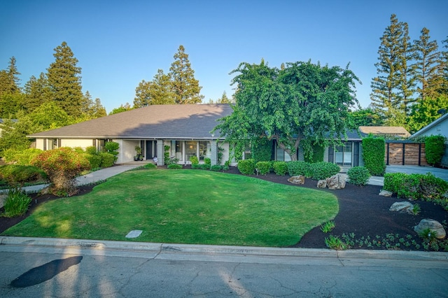 3841 W Alluvial Ave, Fresno, CA 93711 - ranch-style home with a front yard and covered porch