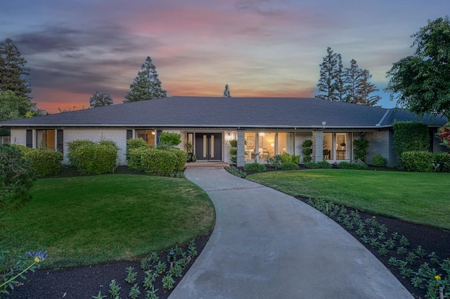 3841 W Alluvial Ave, Fresno, CA 93711 - ranch-style home featuring brick siding and a front yard
