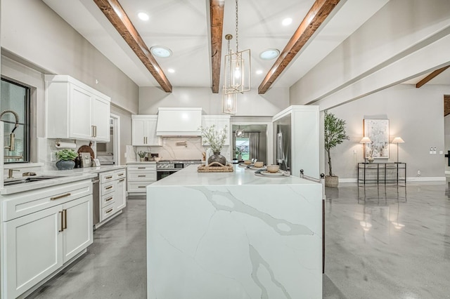 3841 W Alluvial Ave, Fresno, CA 93711 - kitchen with beam ceiling, finished concrete floors, a sink, tasteful backsplash, and stainless steel stove