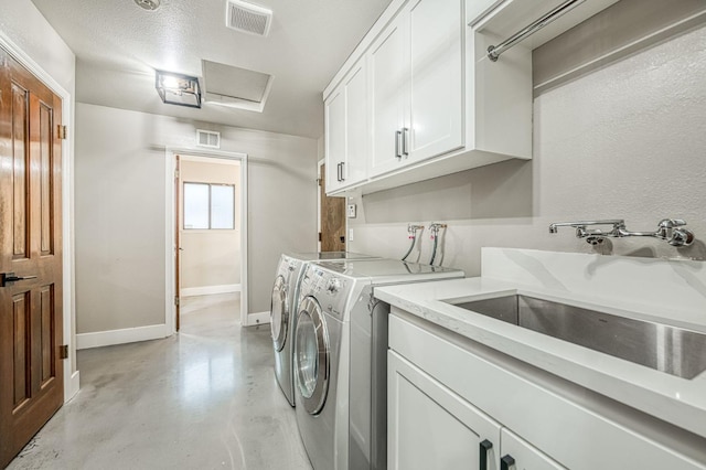 3841 W Alluvial Ave, Fresno, CA 93711 - laundry room with cabinet space, independent washer and dryer, baseboards, and attic access